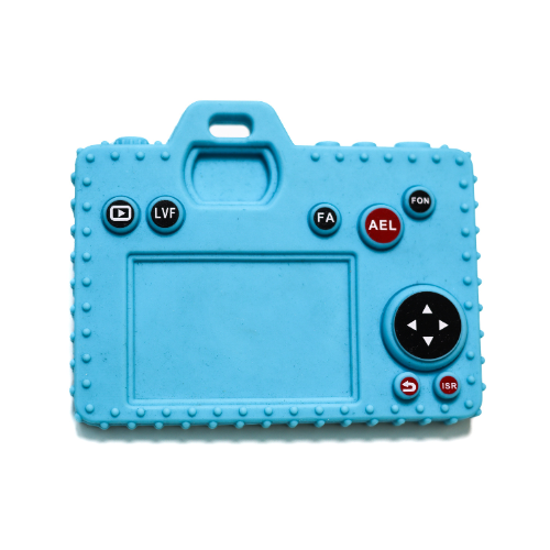 Detalle de los 'botones' con relieve en la parte superior de la mordedera de cámara, diseñados para masajear las encías.